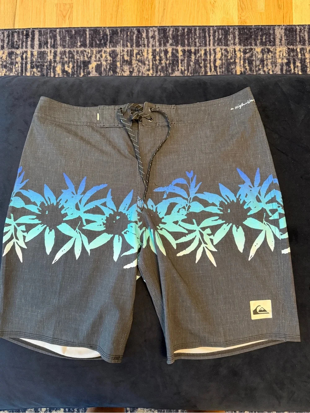 Quiksilver Men’s Black Boardshorts with Blue-Teal Floral Band